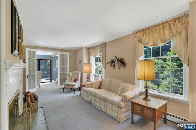 486 Summit Ave, Oradell, NJ 07649 - carpeted living room featuring a baseboard heating unit, a glass covered fireplace, and french doors