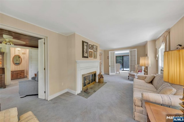 486 Summit Ave, Oradell, NJ 07649 - carpeted living area featuring a fireplace with flush hearth, ornamental molding, and ceiling fan