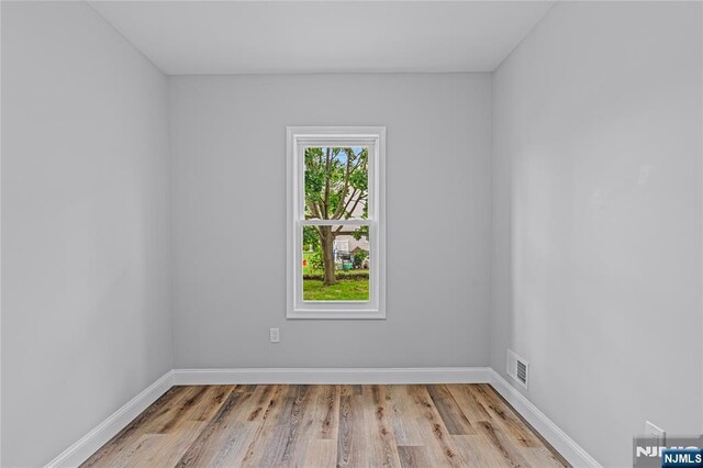 6 Pleasant Ave, Clifton, NJ 07013 - unfurnished room featuring wood finished floors and baseboards