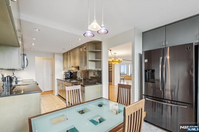 300 Winston Unit 1822, Cliffside Park, NJ 07010 - kitchen featuring appliances with stainless steel finishes, light tile patterned flooring, dark countertops, open shelves, and recessed lighting