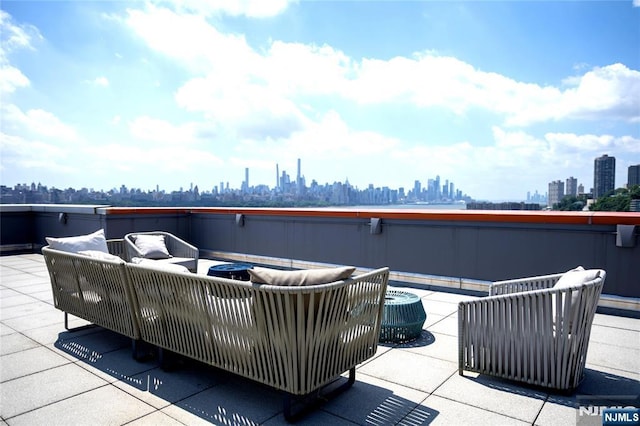 917 Hudson Park, Edgewater, NJ 07020 - view of patio / terrace with an outdoor living space with a fire pit and a skyline view