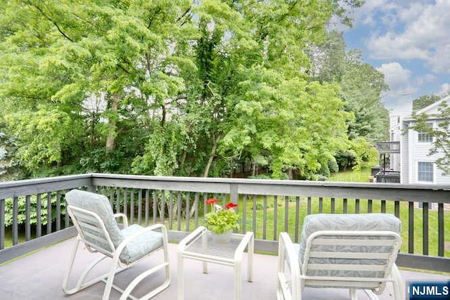 84 Pheasant Run Unit 84, Old Tappan, NJ 07675 - deck with view of scattered trees