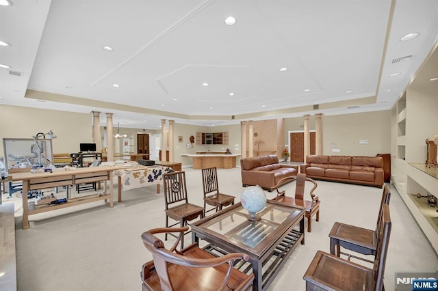 326 Ridge Rd, Cedar Grove, NJ 07009 - living area with ornate columns, a tray ceiling, carpet, and recessed lighting