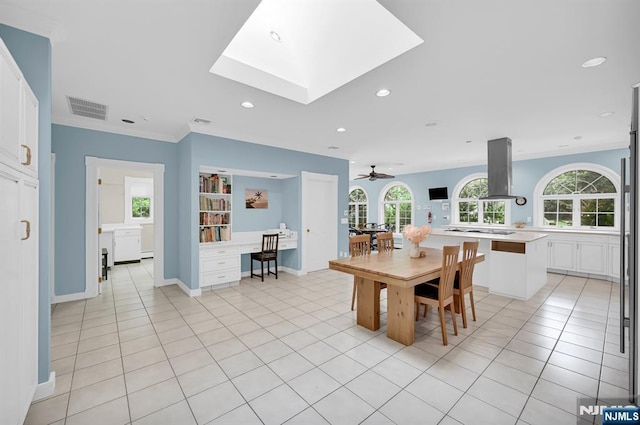 326 Ridge Rd, Cedar Grove, NJ 07009 - dining space featuring light tile patterned floors, recessed lighting, a skylight, and ceiling fan