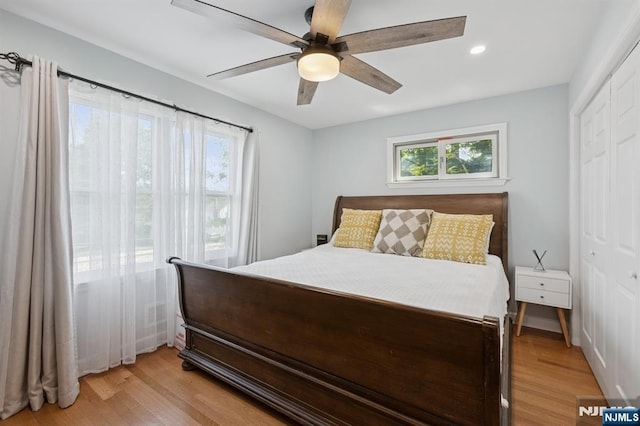 17 Lowell Ave, West Orange, NJ 07052 - bedroom featuring light wood-type flooring, a closet, recessed lighting, and a ceiling fan