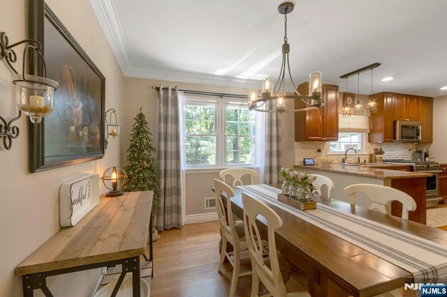 611 Maze Rd, River Vale, NJ 07675 - dining space with a chandelier, light wood finished floors, ornamental molding, and recessed lighting