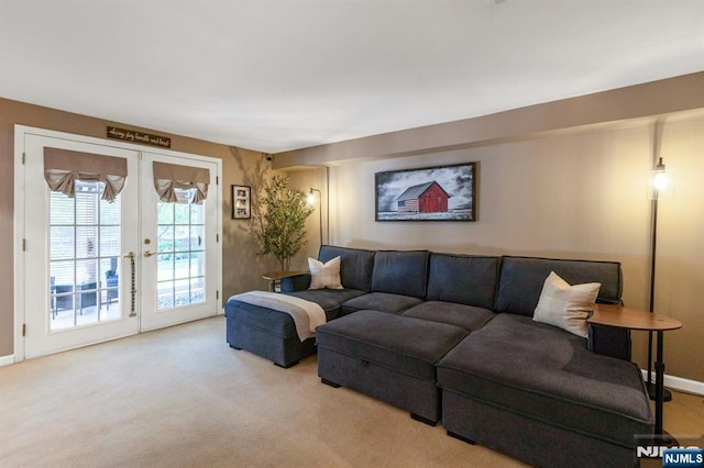 611 Maze Rd, River Vale, NJ 07675 - carpeted living area with french doors and baseboards