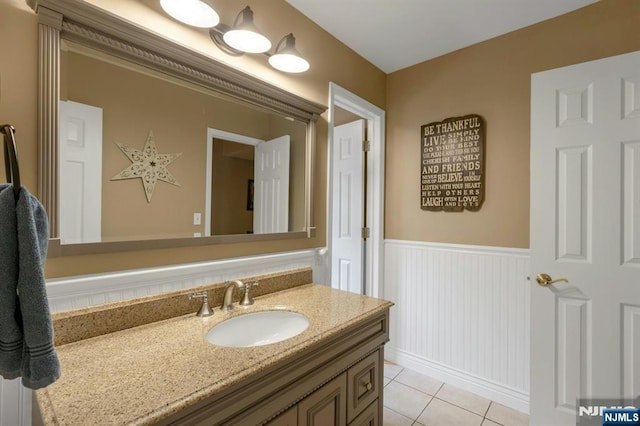 611 Maze Rd, River Vale, NJ 07675 - bathroom featuring a wainscoted wall, vanity, and tile patterned flooring