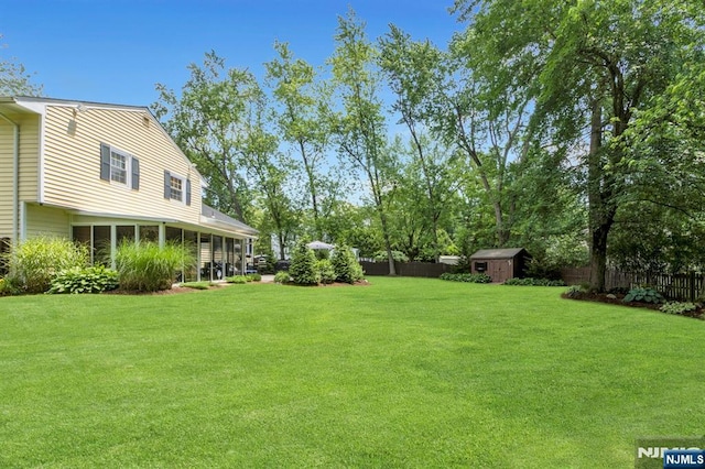611 Maze Rd, River Vale, NJ 07675 - fenced backyard featuring a storage unit