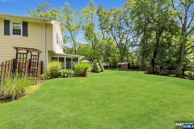 611 Maze Rd, River Vale, NJ 07675 - fenced backyard with a shed and a sunroom