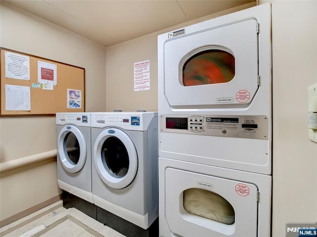 250 Gorge Rd Unit 23I, Cliffside Park, NJ 07010 - community laundry room featuring washing machine and clothes dryer and baseboards
