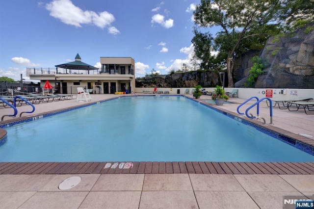 250 Gorge Rd Unit 23I, Cliffside Park, NJ 07010 - community pool featuring a patio