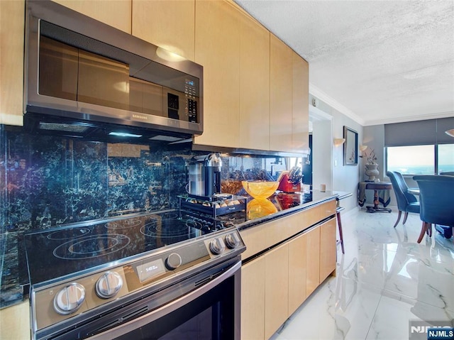 250 Gorge Rd Unit 23I, Cliffside Park, NJ 07010 - kitchen with appliances with stainless steel finishes, light marble finish floors, tasteful backsplash, crown molding, and a textured ceiling