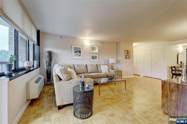 1265 15th St Unit 4C, Fort Lee, NJ 07024 - living area featuring baseboards