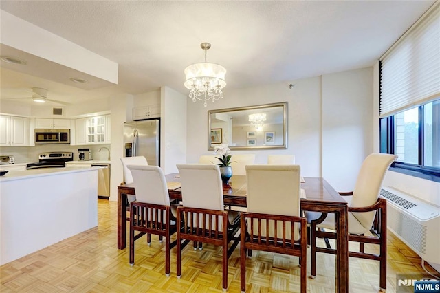 1265 15th St Unit 4C, Fort Lee, NJ 07024 - dining space with a chandelier