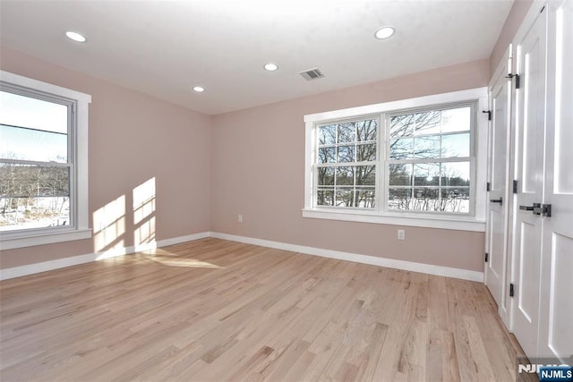 584 N Lake Shr, West Milford, NJ 07421 - unfurnished room featuring healthy amount of natural light, light wood-style floors, and recessed lighting