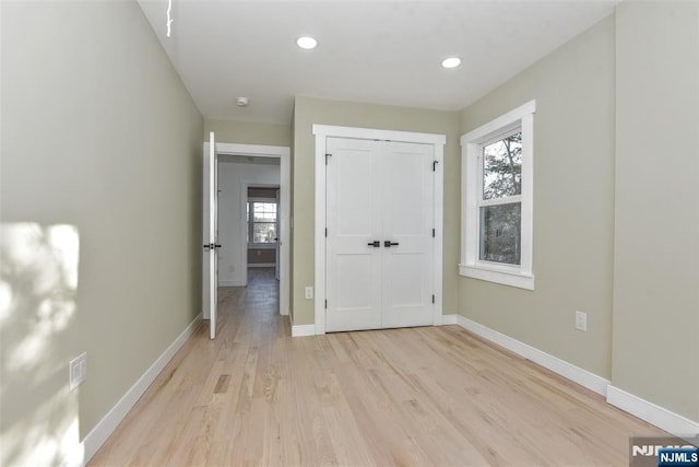 584 N Lake Shr, West Milford, NJ 07421 - unfurnished bedroom featuring light wood finished floors, recessed lighting, and a closet