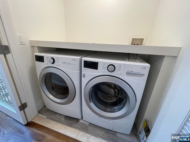 104 Sunset Pl Unit A, Palisades Park, NJ 07650 - laundry area with washer and clothes dryer and baseboards