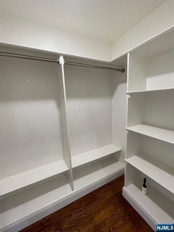 104 Sunset Pl Unit A, Palisades Park, NJ 07650 - walk in closet featuring dark wood finished floors