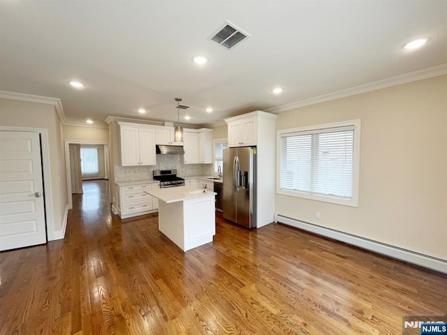 104 Sunset Pl Unit A, Palisades Park, NJ 07650 - kitchen featuring stainless steel appliances, a baseboard radiator, light countertops, white cabinetry, and a kitchen island