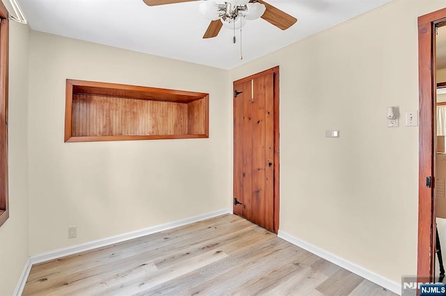 76 Hillside Rd, Sparta, NJ 07871 - empty room with a ceiling fan and light wood-type flooring