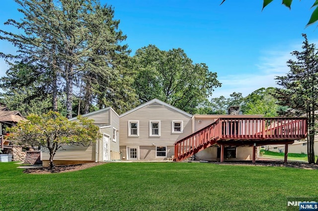 76 Hillside Rd, Sparta, NJ 07871 - rear view of property featuring a deck, stairs, and a lawn