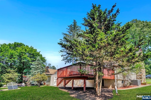 76 Hillside Rd, Sparta, NJ 07871 - back of house with a deck, an exterior structure, stairway, and a lawn