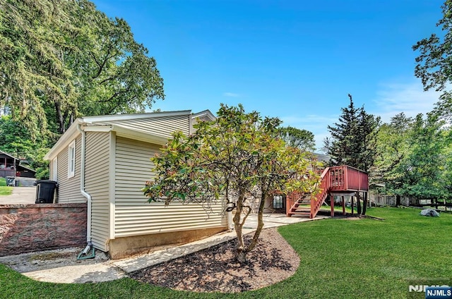 76 Hillside Rd, Sparta, NJ 07871 - back of property with stairway and a deck