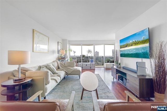 2077 Center Ave Unit 19C, Fort Lee, NJ 07024 - living area featuring dark wood-style floors