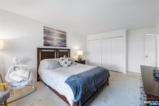 2077 Center Ave Unit 19C, Fort Lee, NJ 07024 - bedroom with two closets and light carpet