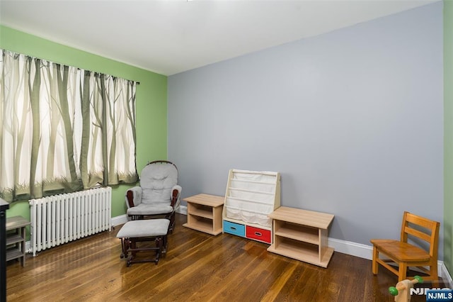 5 Rhinesmith Ave, Wanaque, NJ 07465 - living area with radiator and wood finished floors