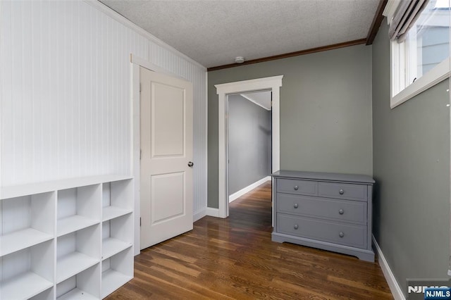 5 Rhinesmith Ave, Wanaque, NJ 07465 - unfurnished bedroom with ornamental molding and dark wood-type flooring