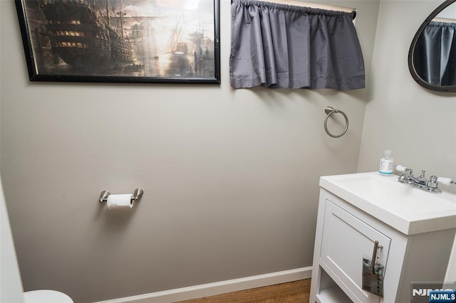 5 Rhinesmith Ave, Wanaque, NJ 07465 - bathroom with vanity and wood finished floors