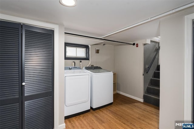 5 Rhinesmith Ave, Wanaque, NJ 07465 - laundry area featuring washer and clothes dryer and light wood-type flooring