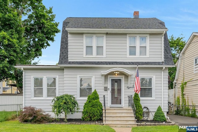 18 Gillies St, Clifton, NJ 07013 - colonial inspired home with a shingled roof and a chimney
