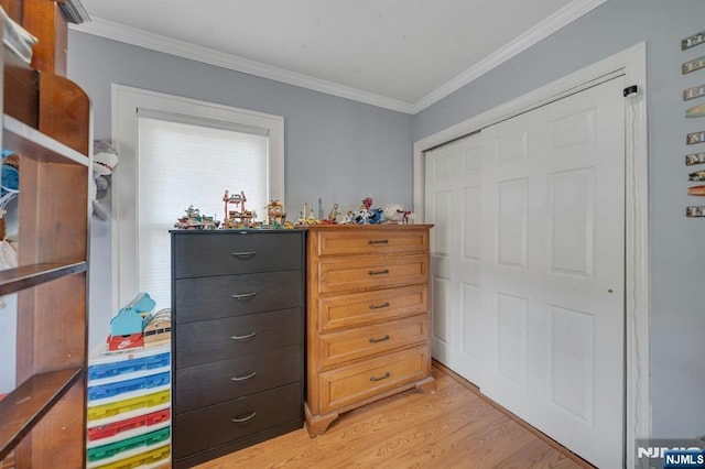 18 Gillies St, Clifton, NJ 07013 - bedroom featuring crown molding, light wood-style floors, and a closet