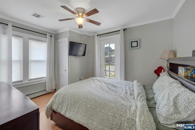 18 Gillies St, Clifton, NJ 07013 - bedroom featuring light wood finished floors, ornamental molding, a baseboard radiator, a ceiling fan, and access to outside