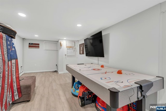 18 Gillies St, Clifton, NJ 07013 - playroom featuring light wood-style flooring and recessed lighting