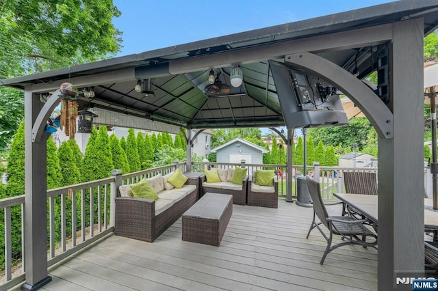 18 Gillies St, Clifton, NJ 07013 - wooden terrace with an outdoor living space, a gazebo, and a storage shed