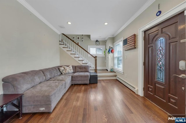 18 Gillies St, Clifton, NJ 07013 - entryway with stairs, wood finished floors, a baseboard radiator, ornamental molding, and recessed lighting