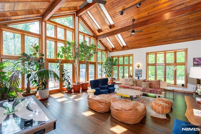 69 Mount Pleasant Rd, Knowlton, NJ 07832 - living area with ceiling fan, high vaulted ceiling, a wooden ceiling with exposed beams, a skylight, and hardwood / wood-style floors