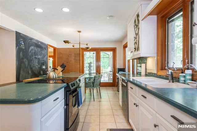 69 Mount Pleasant Rd, Knowlton, NJ 07832 - kitchen with black electric range, dark countertops, recessed lighting, white cabinets, and light tile patterned flooring
