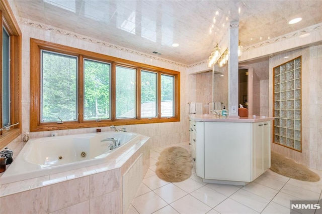 69 Mount Pleasant Rd, Knowlton, NJ 07832 - bathroom featuring vanity, a jetted tub, and tile patterned flooring