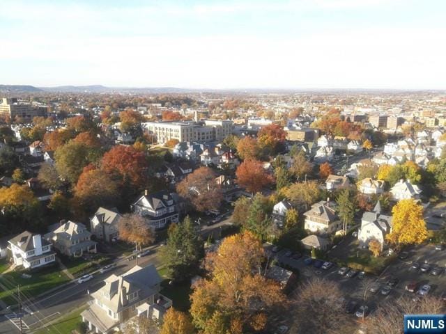 285 Aycrigg Ave Unit 22D, Passaic, NJ 07055 - aerial view of property and surrounding area with nearby suburban area