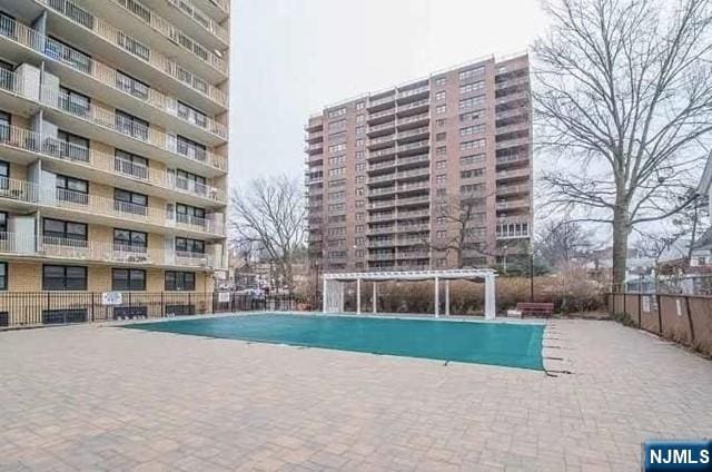 285 Aycrigg Ave Unit 22D, Passaic, NJ 07055 - view of community pool