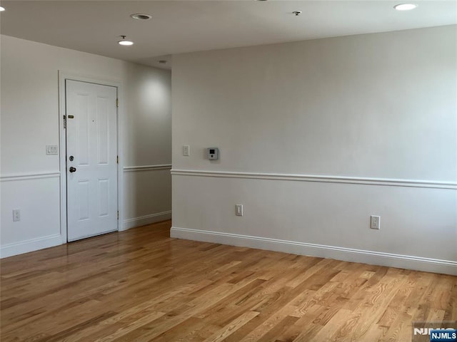 315 7th St Unit 702, Union City, NJ 07087 - unfurnished room with light wood finished floors, recessed lighting, and fire sprinkler in ceiling