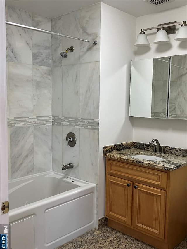 315 7th St Unit 702, Union City, NJ 07087 - bathroom featuring vanity and shower / bath combination