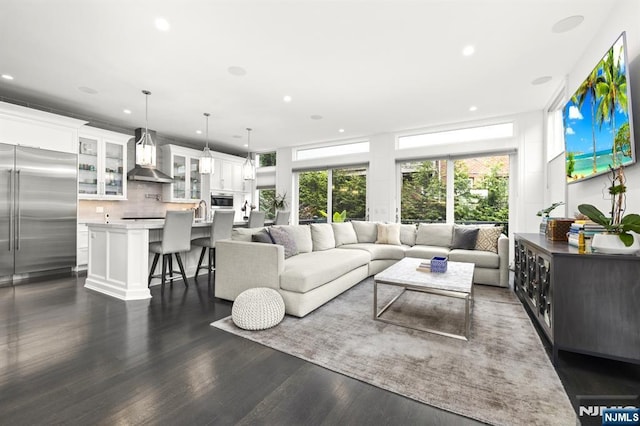 12 Hooks Ln, Edgewater, NJ 07020 - living room featuring recessed lighting and dark wood-type flooring