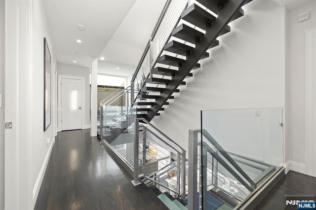 12 Hooks Ln, Edgewater, NJ 07020 - staircase with baseboards and wood finished floors