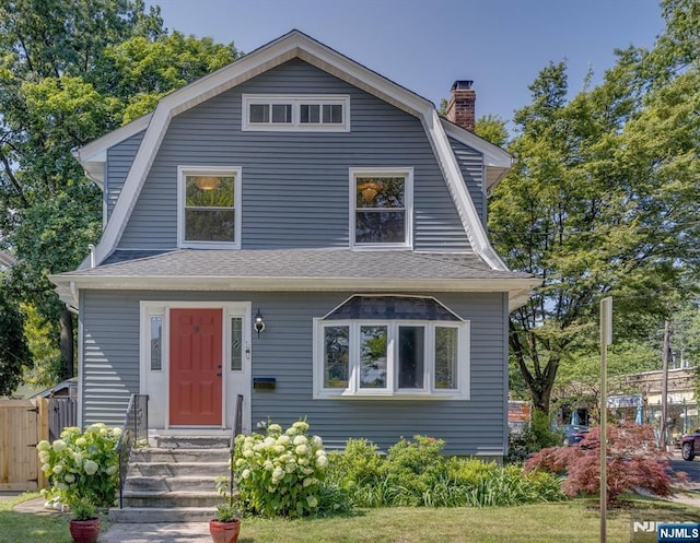 20 Brighton Ave, Bloomfield, NJ 07003 - dutch colonial featuring a gambrel roof, a chimney, and roof with shingles